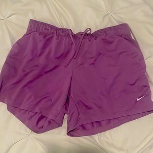 Purple Nike shorts